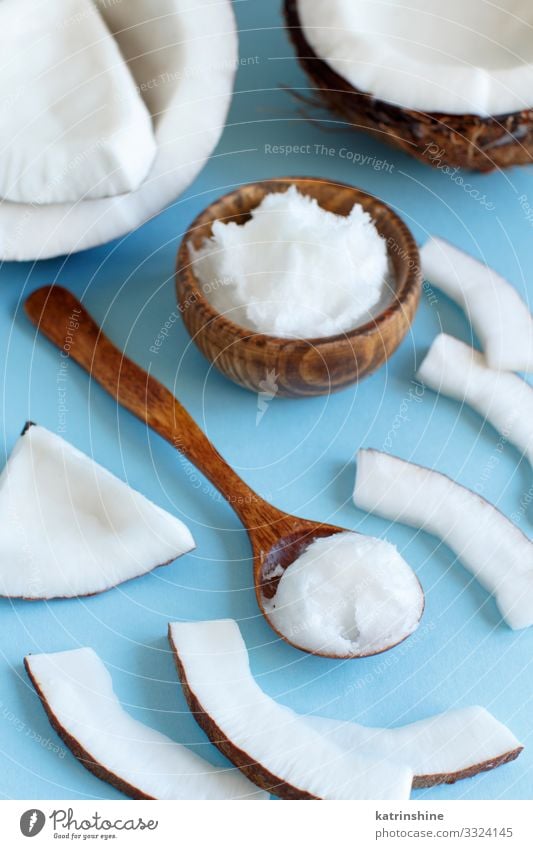 Coconut oil in a bowl with a spoon Vegetable Nutrition Vegetarian diet Diet Bowl Spoon Blue Brown White keto coconut oil Ingredients Light blue Vegan diet