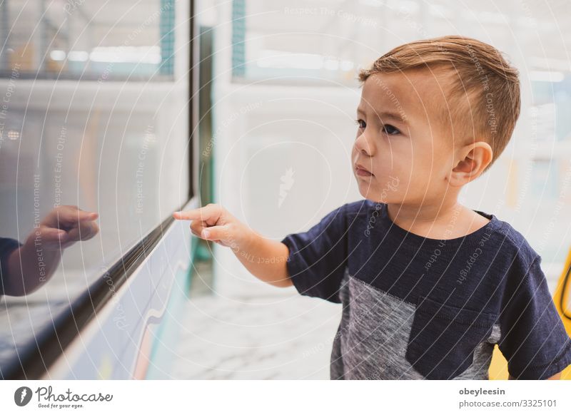 Happy young toddler boy playing in the indoor play area Joy Beautiful Playing Child Human being Baby Toddler Boy (child) Man Adults Family & Relations Infancy