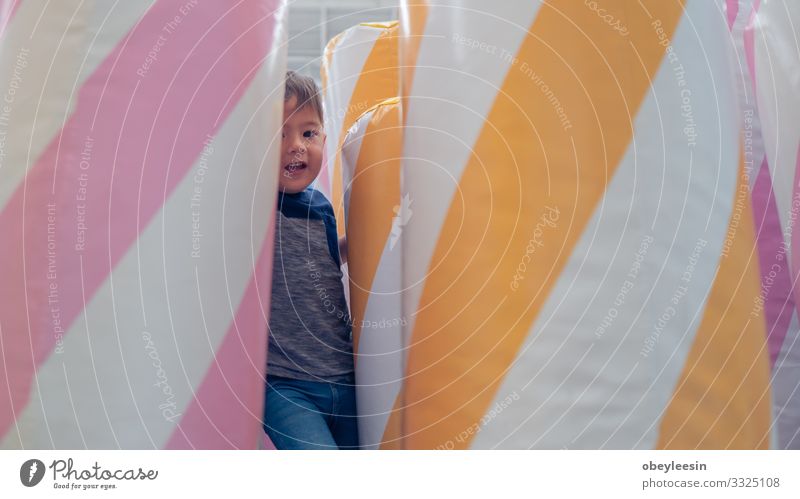 Happy young toddler boy playing in the indoor play area Joy Beautiful Playing Child Human being Baby Toddler Boy (child) Man Adults Family & Relations Infancy