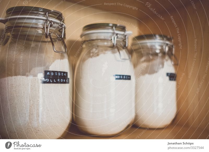 Preserving jars with flour on the kitchen shelf Glass Flour Food Interior shot Deserted Cupboard kitchen cupboard Eating Kitchen Flat (apartment) Healthy