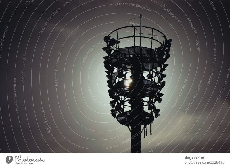 Floodlight mast on the bike race track, with backlight shot. Calm Cycling Sporting Complex Racecourse Lamp post Architecture Environment Sunrise Sunset Summer