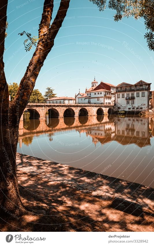 Old Town in Portugal Looking Central perspective Deep depth of field Sunbeam Reflection Silhouette Contrast Shadow Light Copy Space bottom Copy Space top