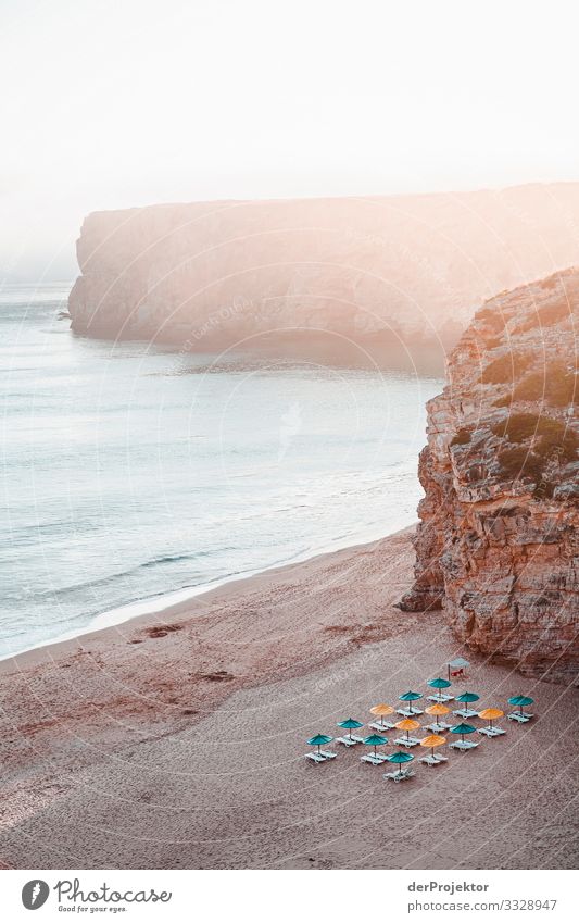 Beach at the Algarve Looking Panorama (View) Sunlight Twilight Deserted Deckchair Joie de vivre (Vitality) Coast Sunrise Waves Sky Rock Contentment Sunshade