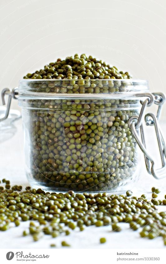 Dried mung beans in a glass jar Vegetarian diet Diet Table Green White Beans fiber food health healthy Ingredients Kidney legume Vegan diet Raw Mung dal