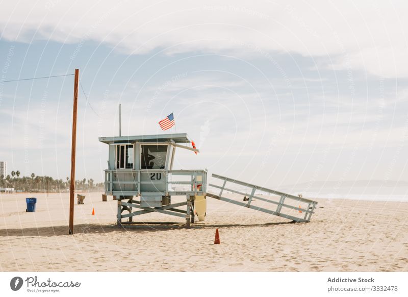 Lifeguard stand on sand beach lifeguard river relax view flag security tourism venice beach usa landscape travel day california architecture vacation america