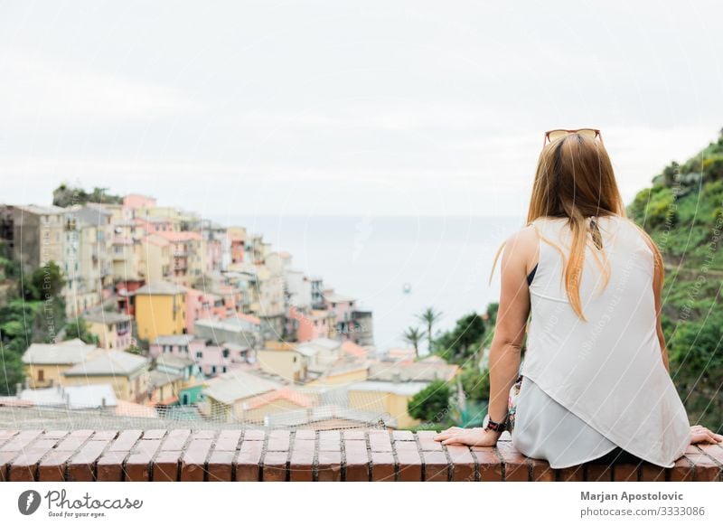 Enjoying a view of the village Manarola by the sea Lifestyle Joy Vacation & Travel Tourism Trip Adventure Freedom Sightseeing City trip Summer vacation Feminine