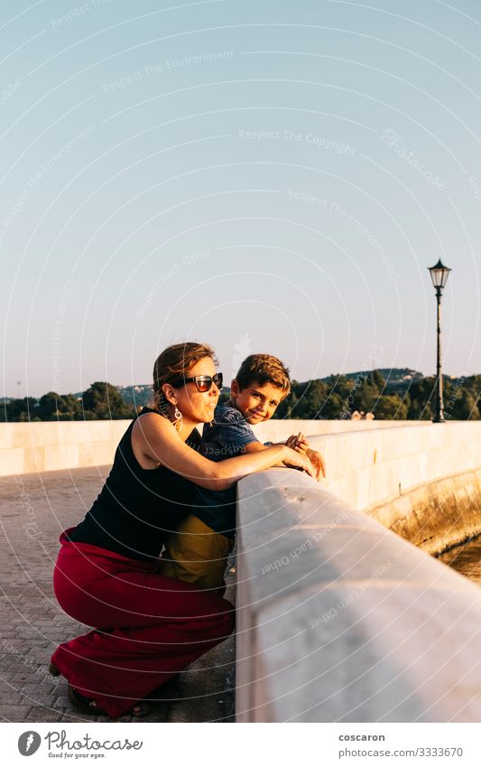 Mother and son enjoying the sunset in Argostoli, Kefalonia Lifestyle Joy Happy Beautiful Relaxation Vacation & Travel Summer Summer vacation Sun Child Masculine