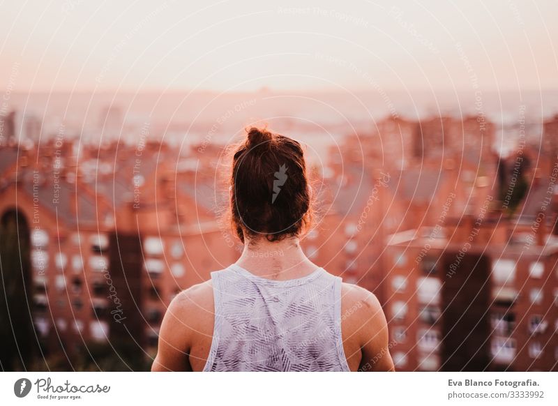 young man in a park ready to practice yoga sport. city background. healthy lifestyle. Concentrate Position Human being Youth (Young adults) Body Park Man