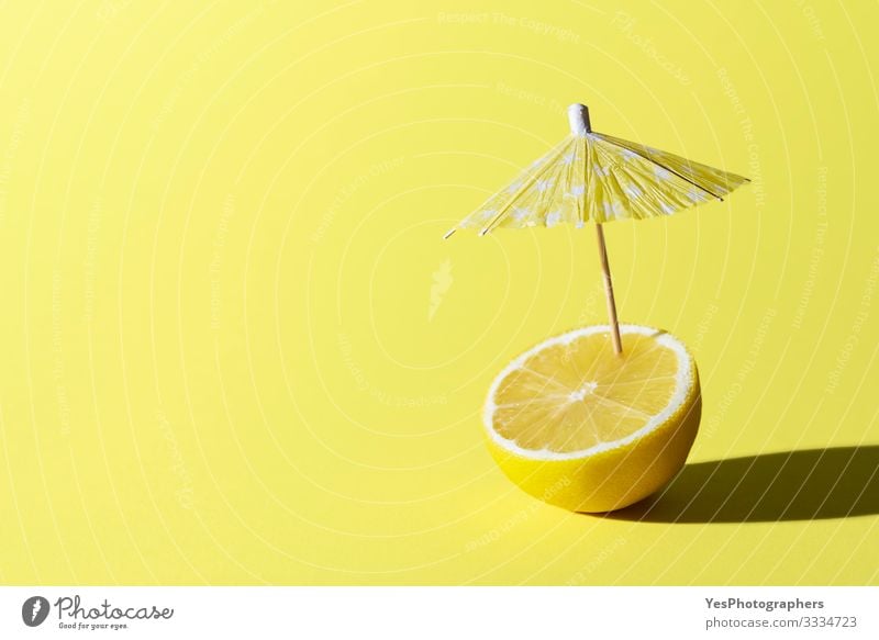 Lemon fruit and cocktail umbrella. Summer drink concept Food Fruit Breakfast Beverage Cold drink Healthy Eating Relaxation Fresh Funny Cute all yellow