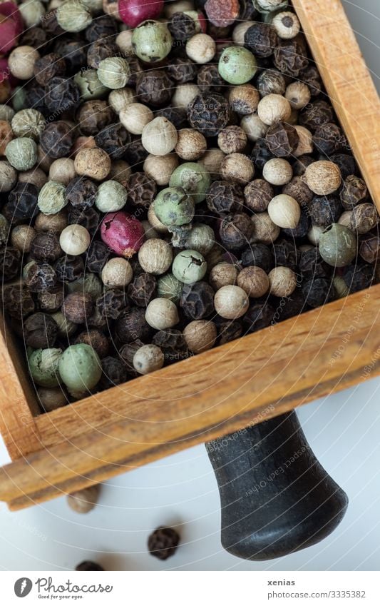 colourful pepper in the drawer Food Herbs and spices Peppercorn Nutrition Living or residing Kitchen Drawer Delicious Round Brown Green Black Spicy Tangy xenias