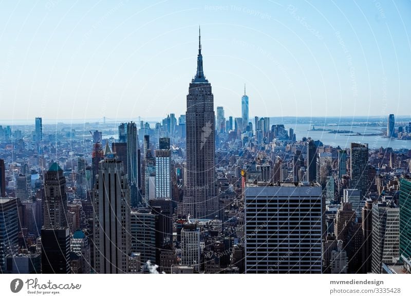 View of the Empire State Building New York City Empire State building vantage point viewing platform downtown gorge of houses Rockefeller Center top of the rock