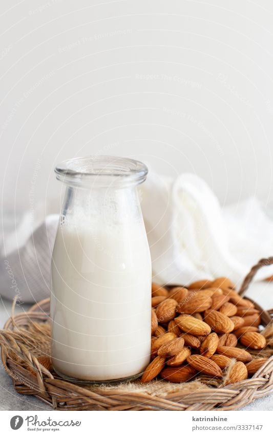 Vegan almond milk, non dairy alternative milk Vegetable Nutrition Breakfast Vegetarian diet Diet Beverage Bottle Fresh Natural Alternative almonds Vegan diet