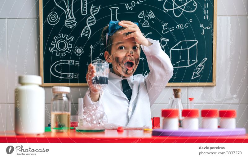 Funny boy chemist with dirty face Playing Science & Research Child School Blackboard Laboratory Human being Boy (child) Man Adults Tie Smiling Smart Disaster