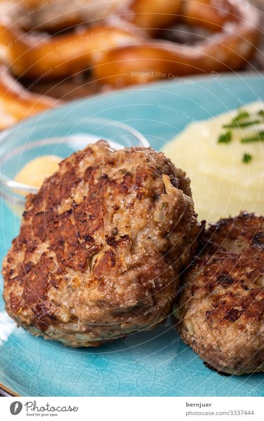 Meatballs on a plate Dinner Plate Gastronomy Warmth Wood Delicious Juicy Blue Brown herbal Meat loaf meatballs Mashed potatoes mashed Minced meat Eating Rustic