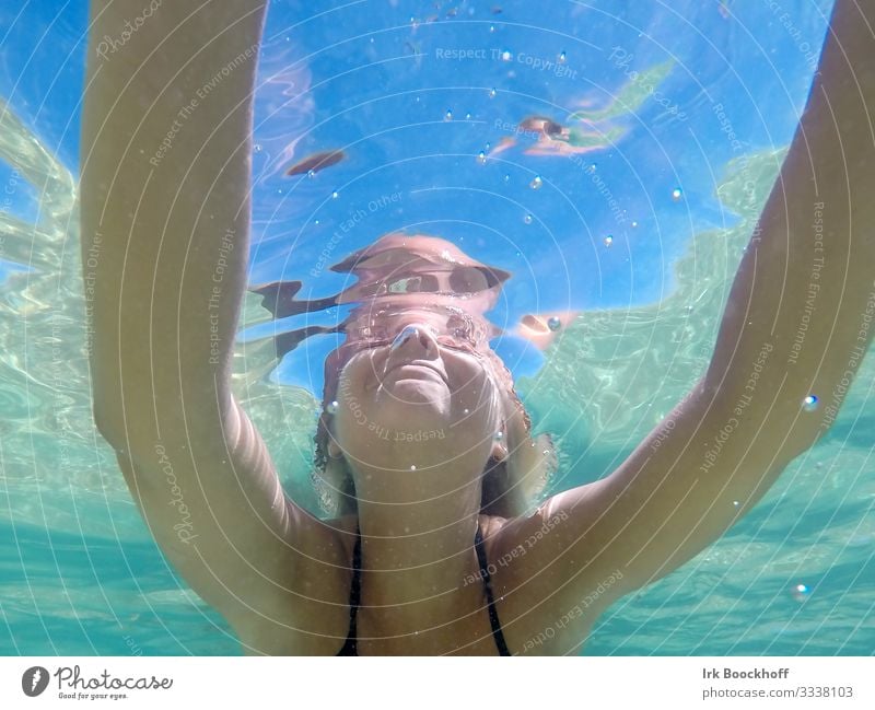 Young girl from below in swimming pool Swimming pool Summer vacation Ocean Swimming & Bathing Feminine Young woman Youth (Young adults) Arm 1 Human being