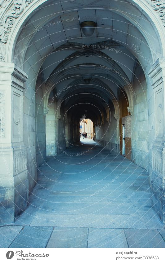 Through this vault you have to go if you want to go to the city.Very nice round arch with in the distance barely visible people. Design Harmonious Trip