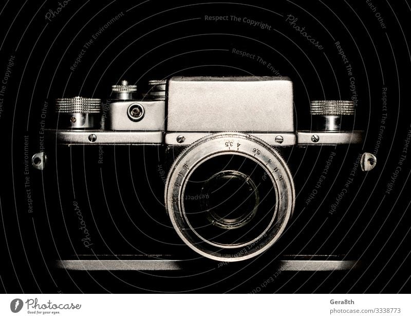 vintage camera on black background closeup Style Wallpaper Camera Technology Lanes & trails Metal Line Old Dark Retro Gray Black White Blank camera contour