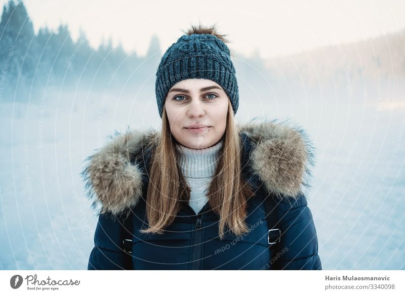 Snow portret of young woman with snow dust in background dof Human being Young woman Youth (Young adults) Body Head 1 18 - 30 years Adults Environment Nature