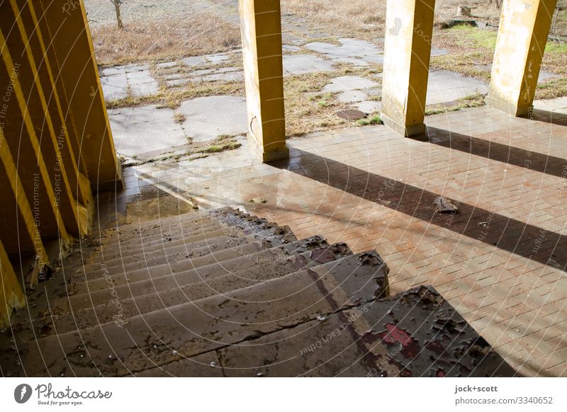 Stairs, descent in the morning Places Military building Column Stone floor Stripe Diagonal Symmetry Decline Transience lost places Ravages of time Shadow play