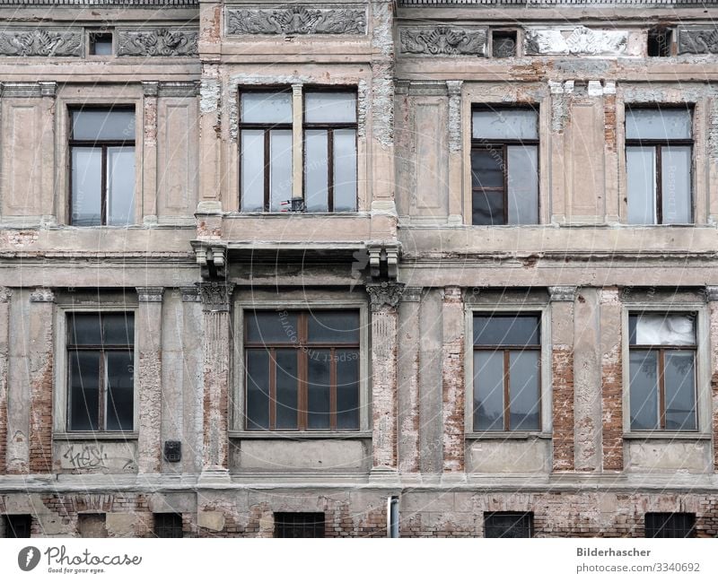 ravages of time Derelict Old Window Old building Redevelop Uninhabited Tumbledown Building Broken Facade Construction site Damage Damage to property Erupted