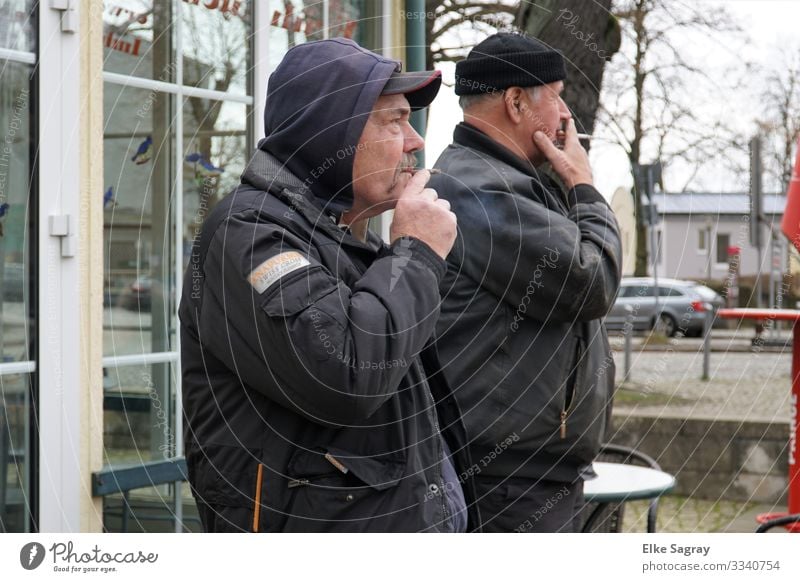 Synchronous Smoker Human being Masculine Male senior Man 2 60 years and older Senior citizen Observe Relaxation Smoking Looking Stand Authentic Original Blue