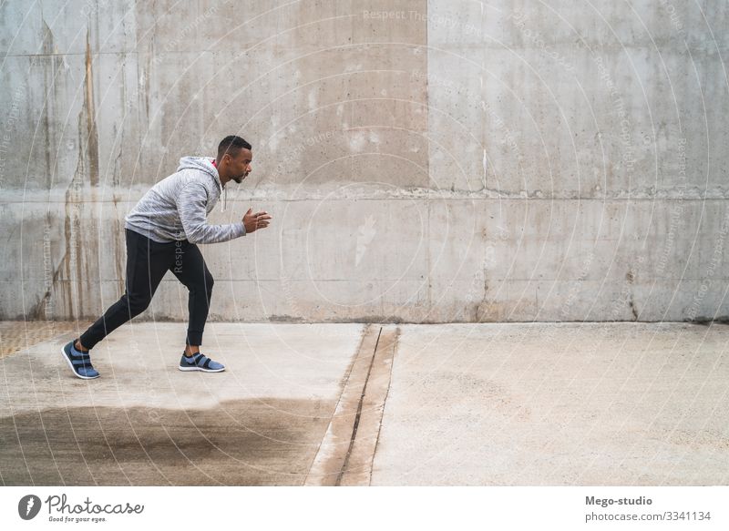 Portrait of an athletic man running. Lifestyle Personal hygiene Body Relaxation Leisure and hobbies Sports Fitness Sports Training Jogging Human being Masculine