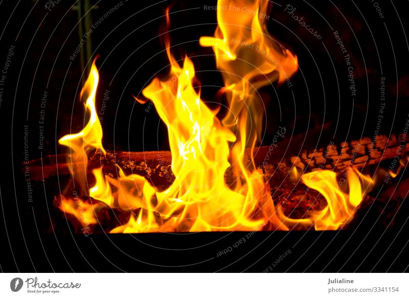 Red fire flame on black background Nature Bright Yellow Black Energy blazing burn fireplace Temperature danger heat burning light exploding Inferno power