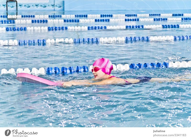 Cute girl in swimming pool Swimming pool Sports Child Schoolchild Infancy Wet White kid preschooler six 7 Caucasian European water Dazzle Colour photo