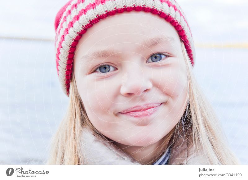 Cute girl in red hat Child Schoolchild Woman Adults Infancy Autumn Hat Blonde Smiling Blue Red White Emotions kid preschooler one Lady six 7 Caucasian European