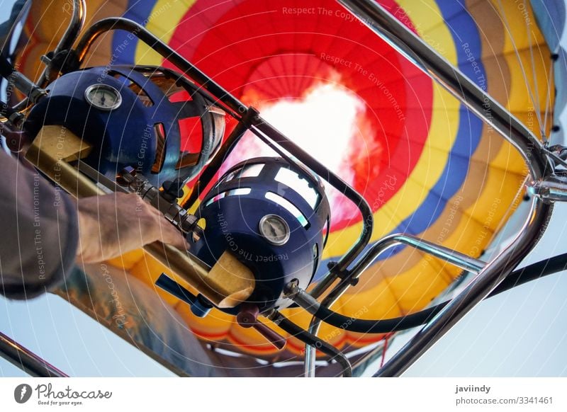 Captive balloons in Aeroestacion Festival in Guadix Joy Relaxation Leisure and hobbies Vacation & Travel Adventure Sky Clouds Transport Balloon Hot Blue Yellow