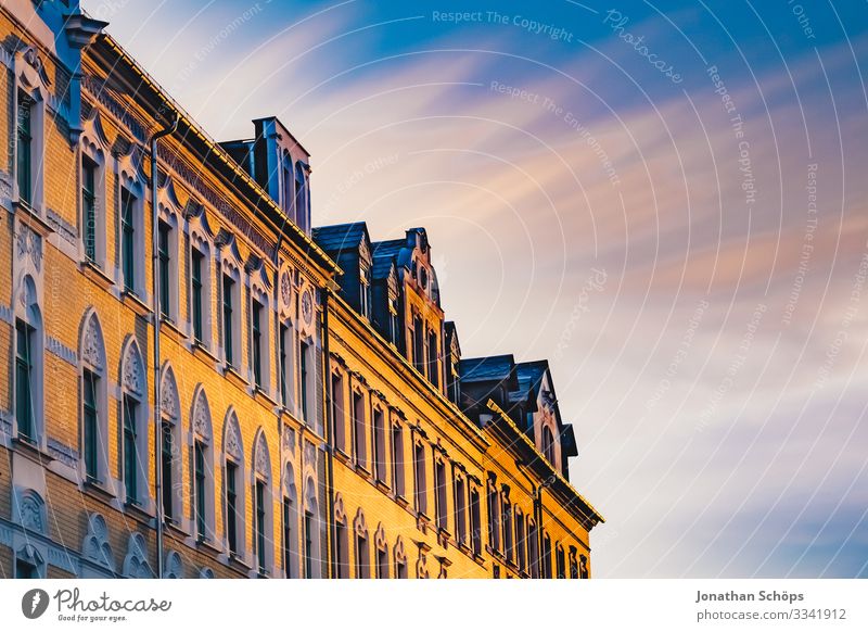 Evening sun on house facade with sky Chemnitz Germany Twilight Saxony Facade Facades Sunlight evening light evening mood Apartment Building Blue sky Deserted