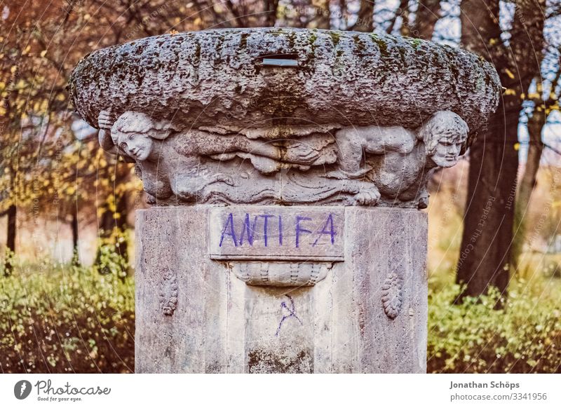 Antifa Day Evening sun Twilight Anti-fascism antifa Graffiti Monument Sculpture Stone block Well Column Manmade structures object Politics and state Left