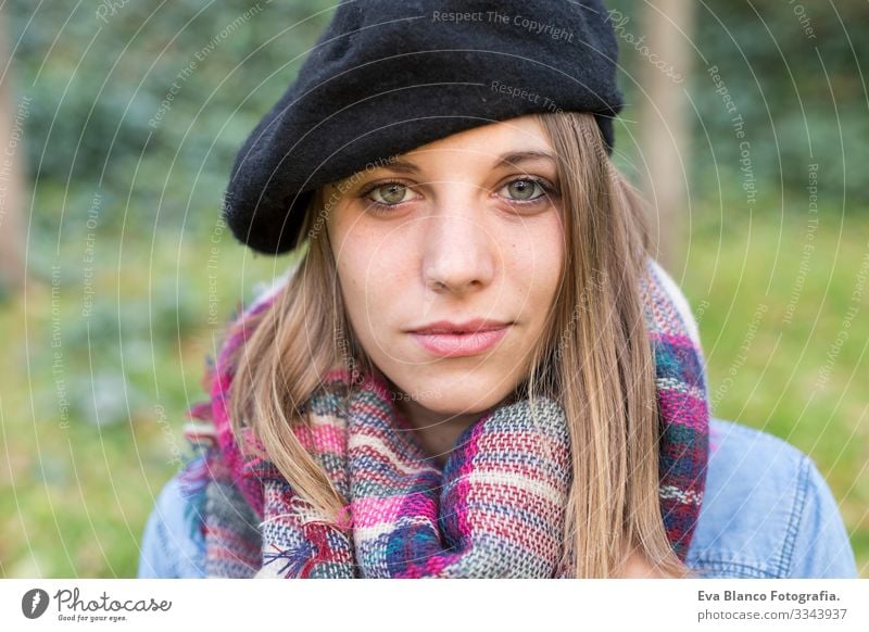 outdoors portrait of a beautiful young woman looking at the camera and smiling. Woman posing in autumn. sunset Youth (Young adults) Happy Beautiful