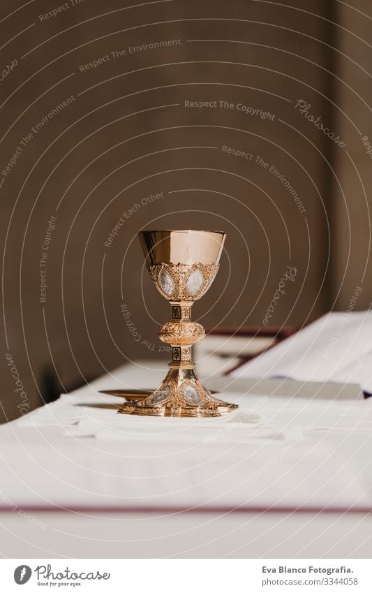 goblet of wine on table during a wedding ceremony nuptial mass. Religion concept jesus Ritual Protestant Modern divine Cup eucharist Goblet Christianity rite