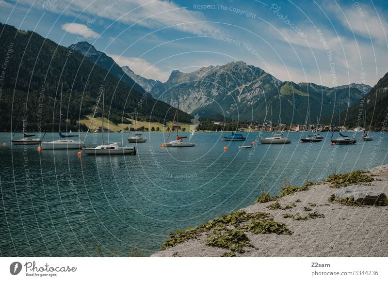 lake achen Lake Achensee Mountain boats ships Beach Austria Alps Relaxation Vacation mood vacation Body of water Sky Sun Summer Bay mountain lake