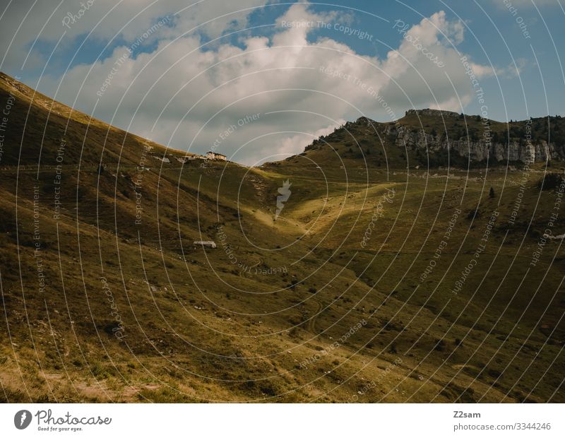 Monte Baldo alpine crossing Lake Garda Mountain bike mtb transalp monte baldo mountain pass road Clouds Sky Blue Meadow Landscape Colour photo Exterior shot