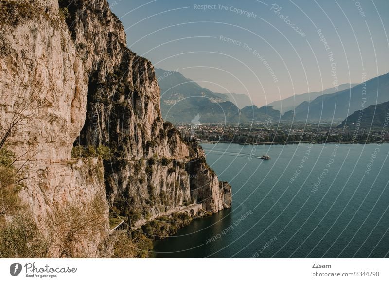 View from the Ponale on Lake Garda alpine crossing Mountain bike mtb ponal northern italy Italy Torbole ship Summer Sun mountains Beautiful weather Blue Sky