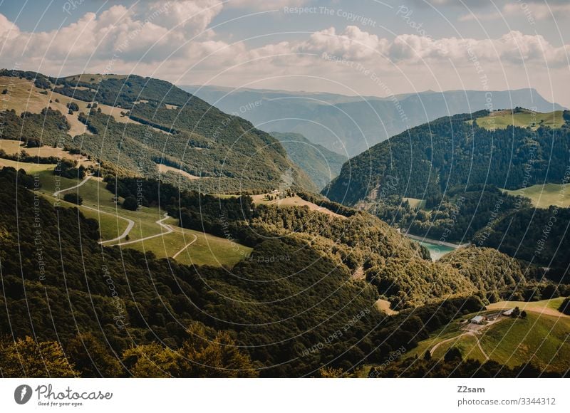 Monte Baldo / Italy Lake Garda Mountain bike mtb mountains monte baldo Summer Sun Clouds Light Shadow Village Winding road Landscape Nature green Alps Sky