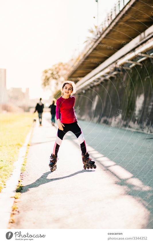 Little skater skating on a park in a sunny day Lifestyle Joy Happy Beautiful Leisure and hobbies Playing Summer Sports Sportsperson Cycling Child School