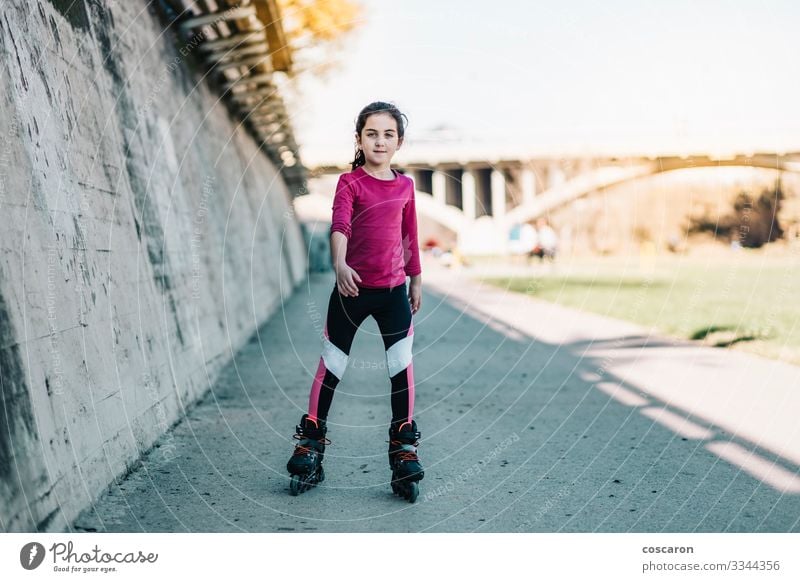 Little skater skating on a park in a sunny day Lifestyle Joy Happy Beautiful Healthy Wellness Leisure and hobbies Playing Summer Summer vacation Sports