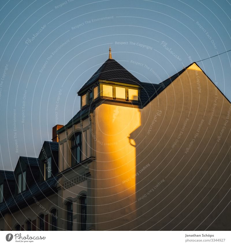 Evening sun from empty house facade Chemnitz Germany Twilight Saxony Facade Facades Sunlight evening light evening mood Roof Apartment Building Blue sky