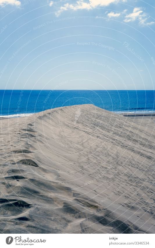 blue sea Colour photo Exterior shot Ocean Dune Beach dune Sand Sky Horizon Copy Space Nature Summer Blue Beige Footprint Deserted Far-off places Calm Smoothness