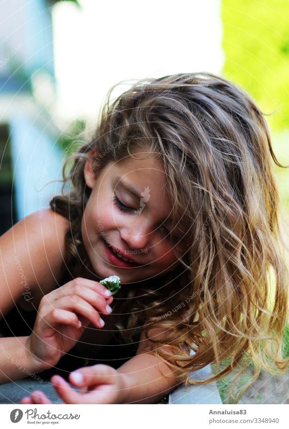 little flowers Feminine Child Girl Hair and hairstyles Face 1 Human being 3 - 8 years Infancy Sunlight Flower Grass Blossom Garden Park Meadow Blonde