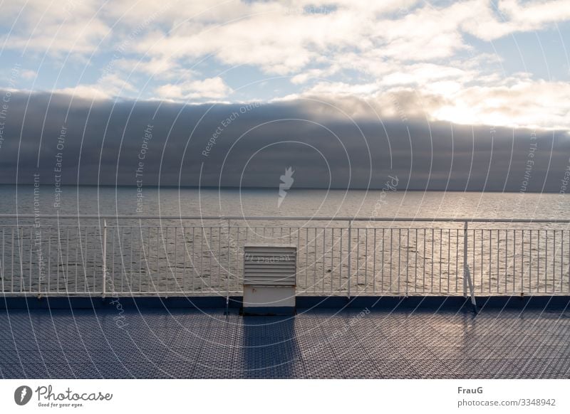 It smells like... sea... and rain... Ocean Ferry Ventilation shaft Handrail Cloud formation Sun Light Crossing Vacation & Travel Navigation Travel photography