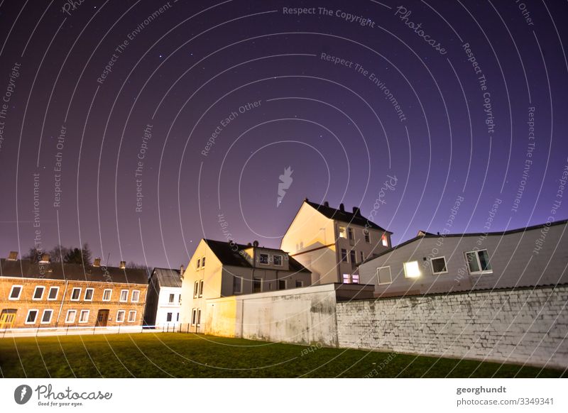 Folded up apartment buildings Night Town Shadow Street lighting light pollution Gloomy Northern Germany Window Wall (barrier) Starry sky Wide angle Extinct