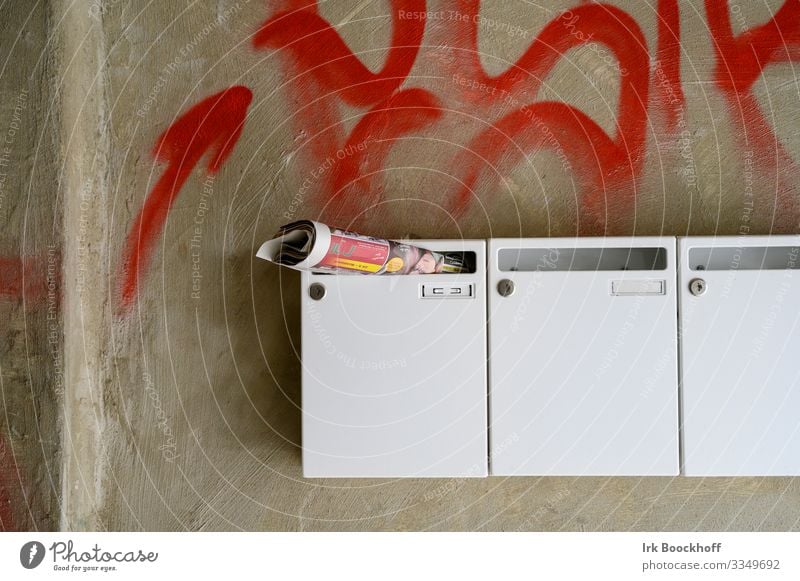 Mailboxes and wall with graffiti High-rise Building Wall (barrier) Wall (building) Concrete Sign Graffiti Brown White Destruction Colour photo Day