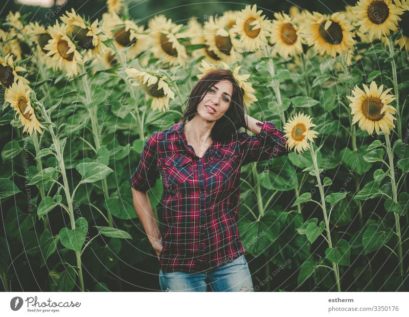 Young Woman in Sunflower Field Lifestyle Beautiful Wellness Vacation & Travel Freedom Summer Human being Feminine Young woman Youth (Young adults) Adults 1