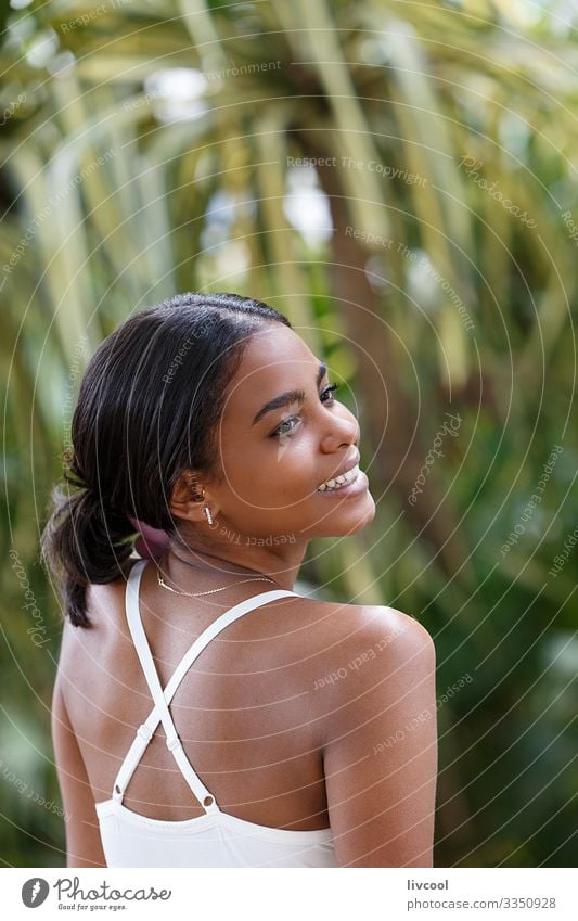 beautiful young woman in a park , havana Lifestyle Happy Island Garden Human being Feminine Young woman Youth (Young adults) Woman Adults Head Face Eyes Ear