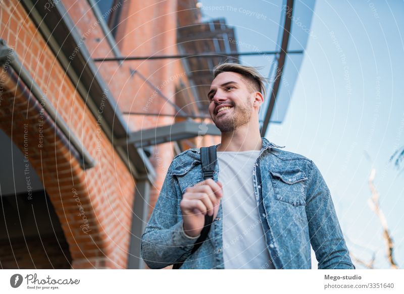 Man walking on the street. Lifestyle Style Happy Beautiful Relaxation Leisure and hobbies Human being Masculine Adults 1 18 - 30 years Youth (Young adults) Town