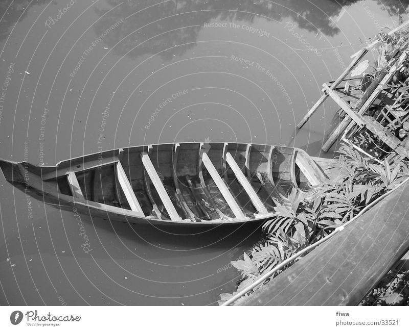 Boat at the shore Watercraft Wood Calm River Coast Black & white photo